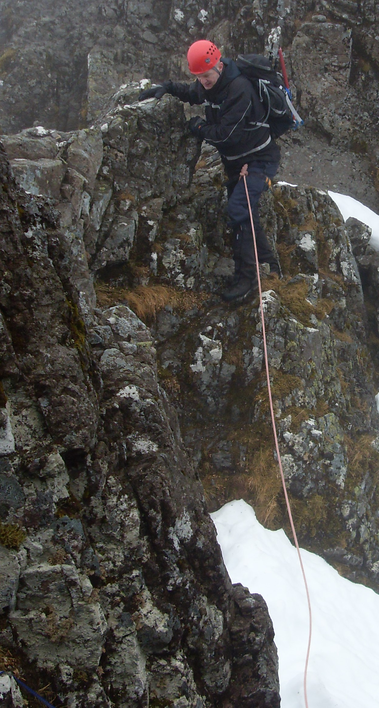 Reg Harris Taking care on greasy rock in mixed winter conditions on the Aonach Eagach Ridge(the narrowest ridge on the British mainland)