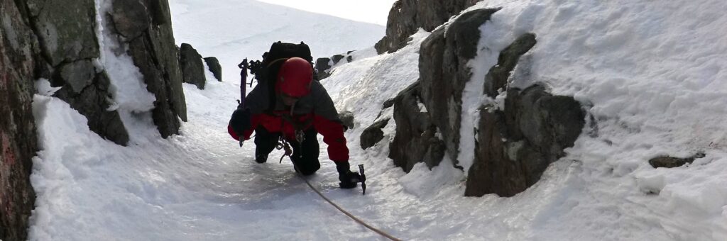 Reg Harris coming up to the first belay on Right Twin Aonach Mor Nevis