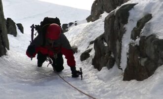 Reg Harris coming up to the first belay on Right Twin Aonach Mor Nevis