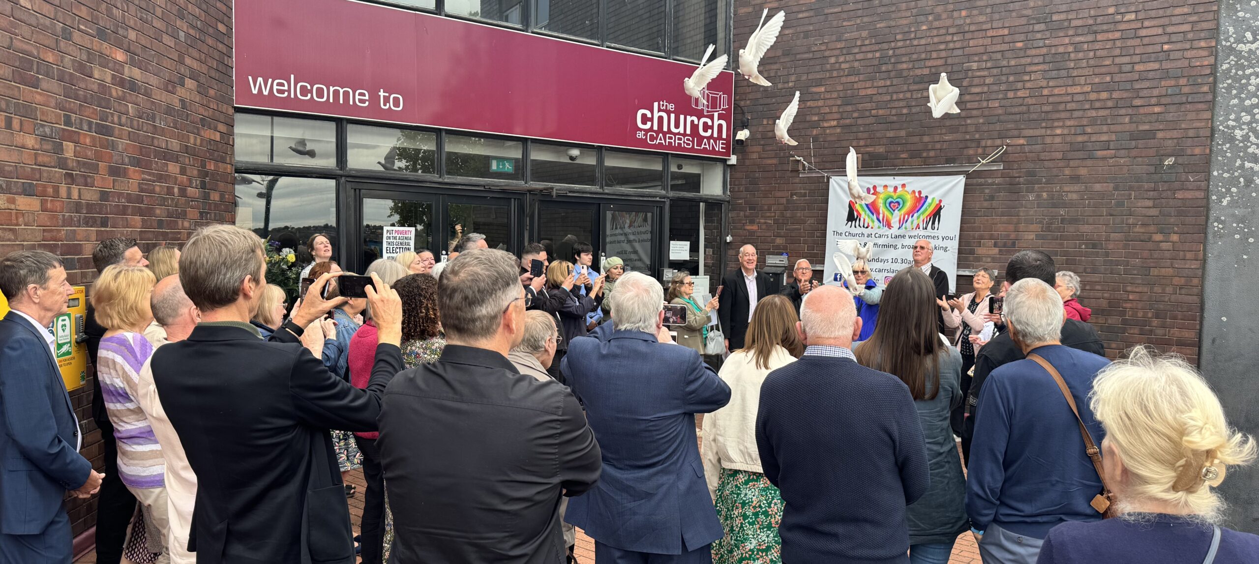 Dove release outside Carrs Lane Church in Birmingham on Action Mesothelioma Day